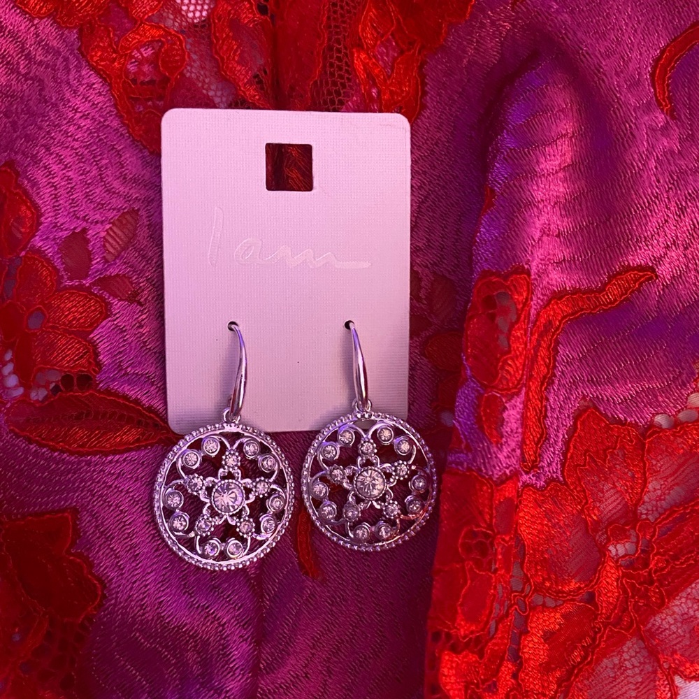 Beautiful silver statement earrings, brand new in package, never worn